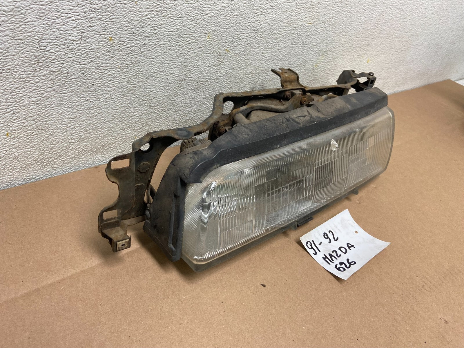 1988 to 1992 Mazda 626 Left Driver LH Headlight  Halogen E0860 DG12