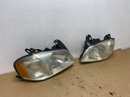 2001 2002 2003 2004 Mazda Tribute Left+Right Side Set Headlights AG2406 DW2