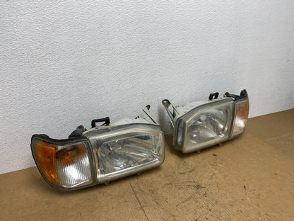 1999-2004 Nissan Pathfinder Left+Right Side Set Halogen Headlights Oem AC3404 DW2