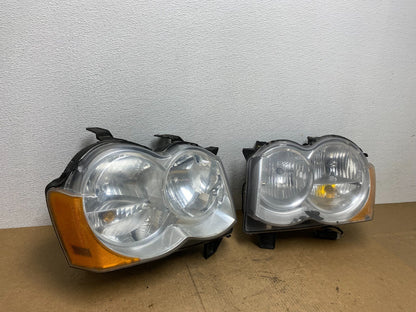 2009-2010 Jeep Grand Cherokee Left+Right Set Halogen Headlights AC3422 DW2