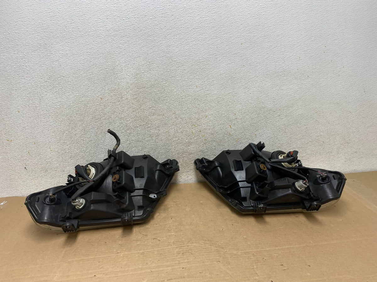 2008 to 2012 Nissan Pathfinder Halogen Headlights Left+Right AH9432 DW7