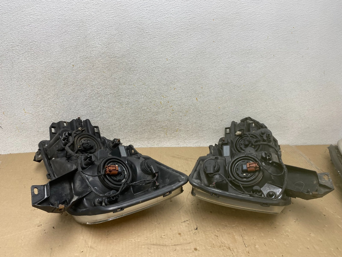 2004 to 2007 Nissan Armada Left+Right Side Set Headlights AH6884 DW12