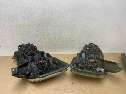 2004 to 2007 Nissan Armada Left+Right Side Set Headlights AH6884 DW12