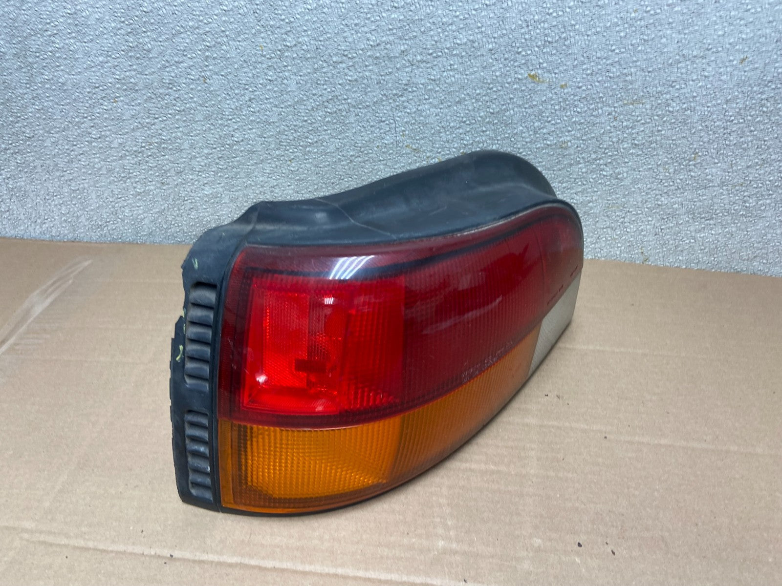1990 to 1992  Isuzu Impulse Left Driver LH Side Tail Light OEM AA8608 DG2