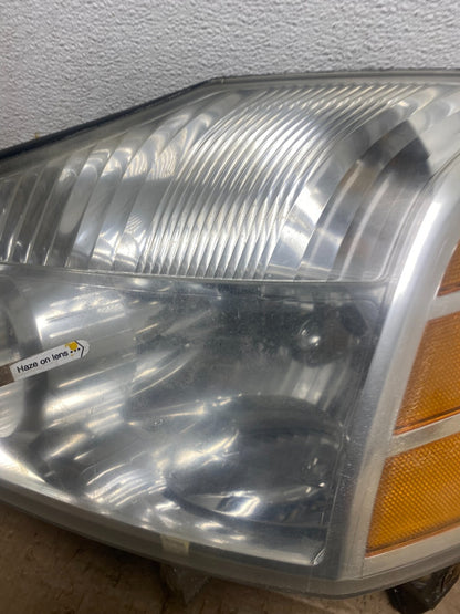 2004 to 2007 Nissan Armada Left+Right Side Set Headlights Oem M4135 DW13