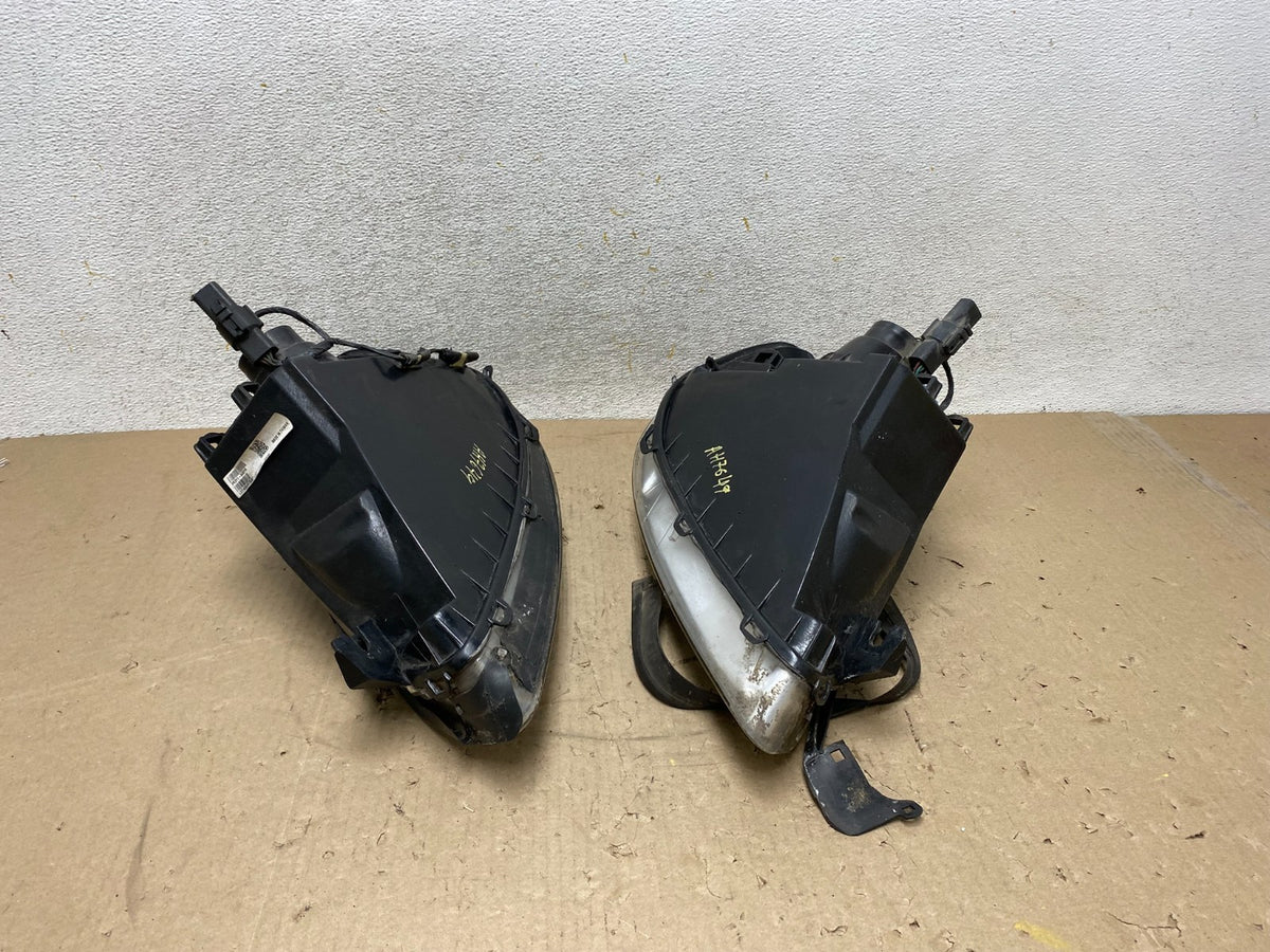 2000 to 2007 Ford Taurus Left+Right Side Halogen Headlights AH7649 DW7