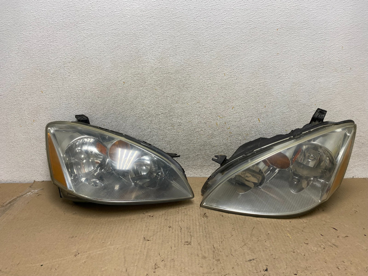 2002 to 2004 Nissan Altima Left+Right Side Set Halogen Headlights AH7648 DW0