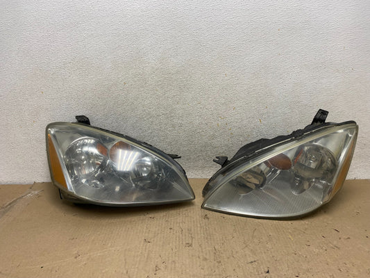 2002 to 2004 Nissan Altima Left+Right Side Set Halogen Headlights AH7648 DW0