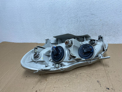 2003 to 2004 Toyota Corolla Right Passenger RH side Headlight AE9040 DW7
