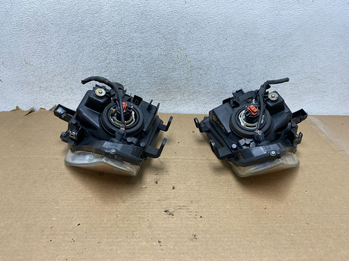 2008 to 2012 Nissan Pathfinder Halogen Headlights Left+Right AH4045 DW7