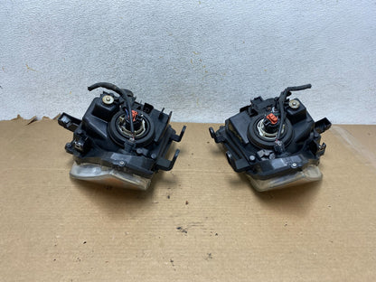 2008 to 2012 Nissan Pathfinder Halogen Headlights Left+Right AH4045 DW7