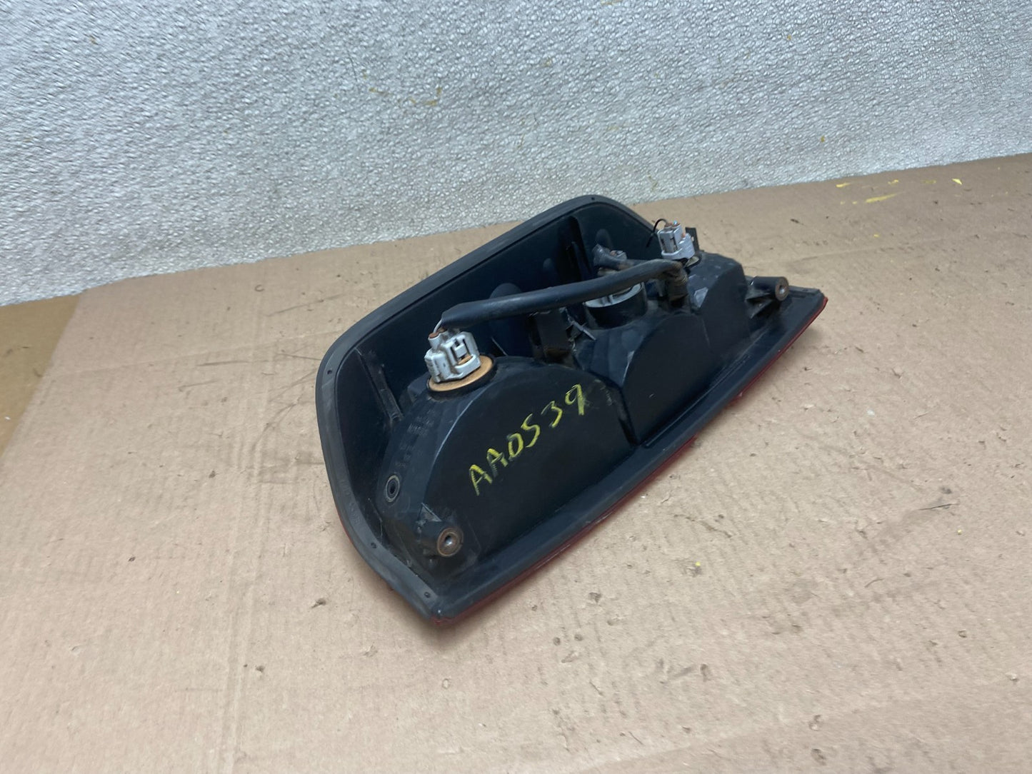 2005 to 2014 Nissan Frontier Left Driver LH Side Tail light Oem AA0539 DW6