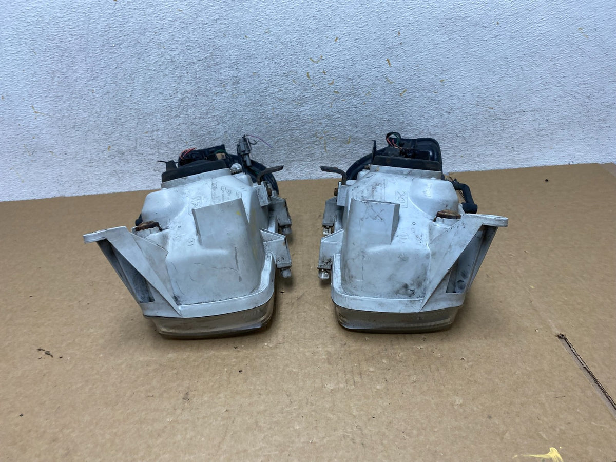 1999-2004 Nissan Pathfinder Left+Right Side Set Halogen Headlights AI2646 DW11