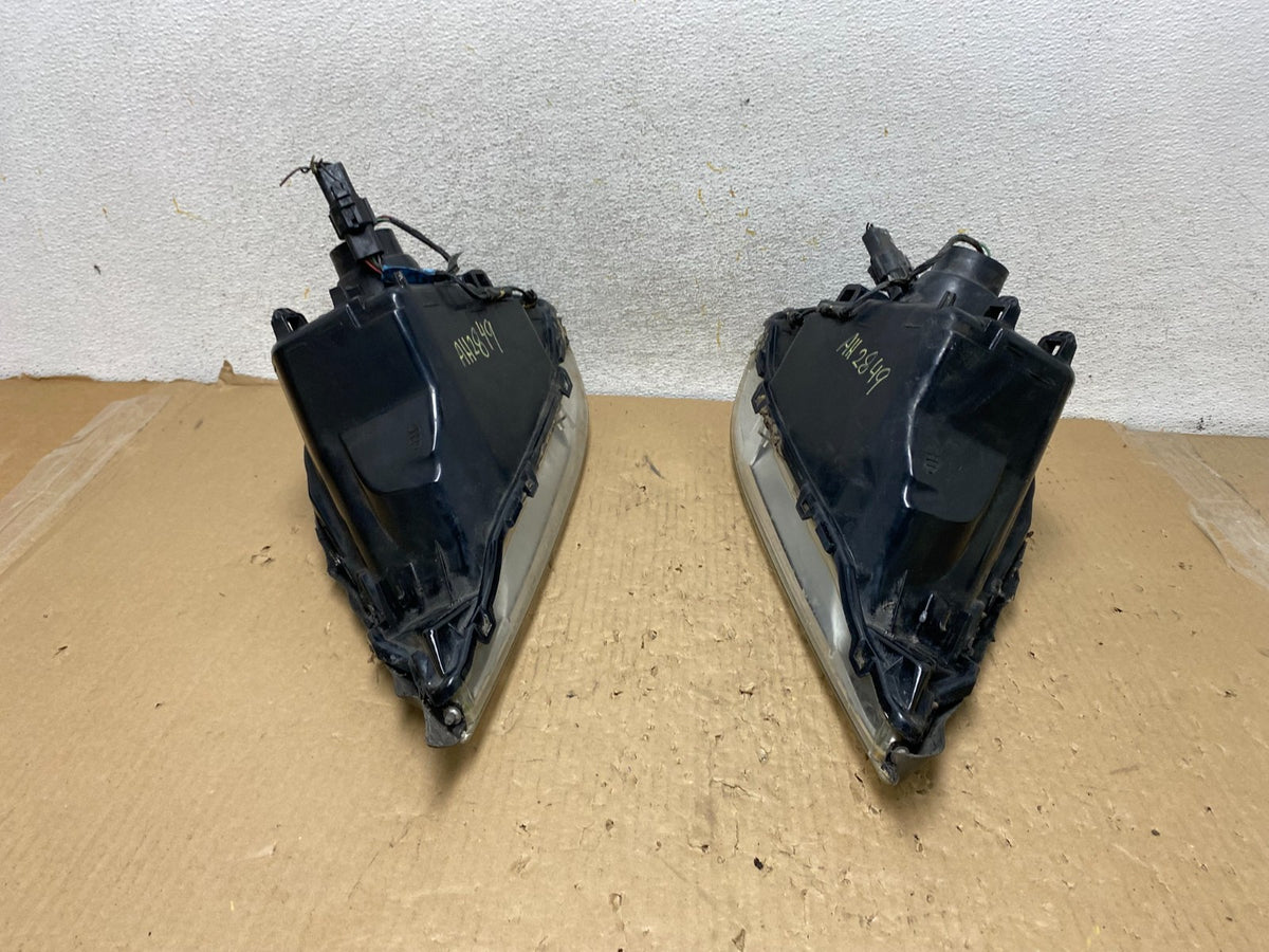 2000 to 2005 Mercury Sable Left+Right Side Halogen Headlights AH2849 DW11
