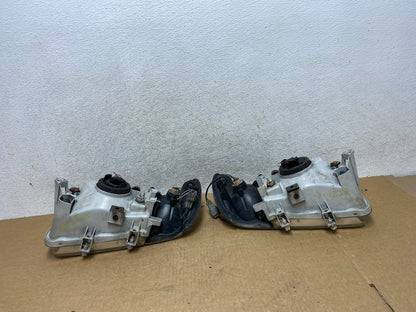 1999-2004 Nissan Pathfinder Left+Right Side Set Halogen Headlights AI2646 DW9