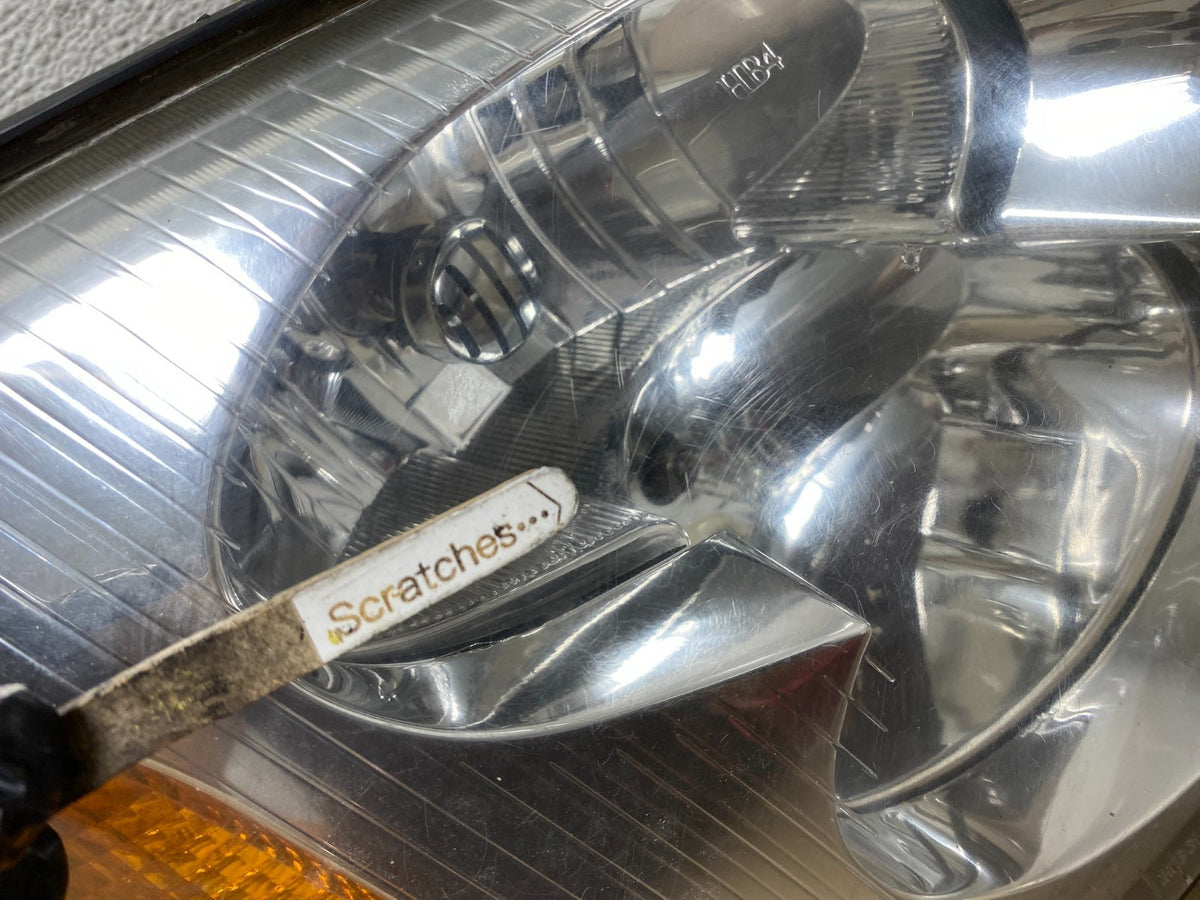 2002 to 2009 Gmc Envoy Right Passenger RH Side Headlight Halogen TYC AH7657 DW3