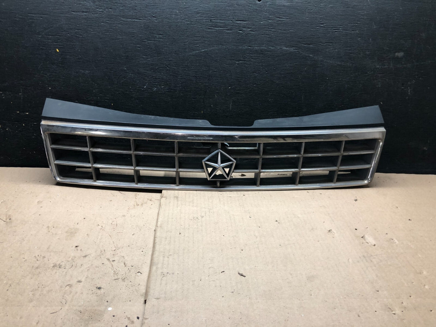 1989 to 1994 Plymouth Sundance Front Chrome Grill 4451502 N02580