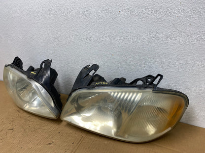 2001 2002 2003 2004 Mazda Tribute Left+Right Side Set Headlights AC7706 DW2