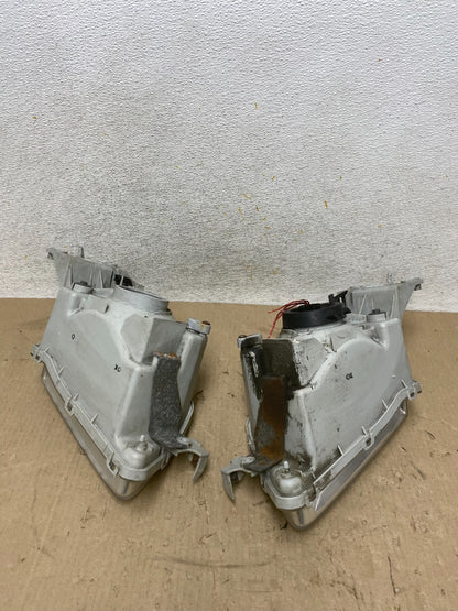 1999 to 2000 Mazda Protege Left+Right Side Headlights AH6890 DW6