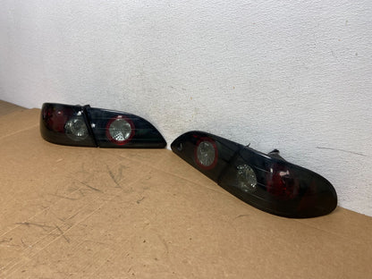 1998 to 2002 Toyota Corolla Left+Right Set Black Tail lights ad6368 DG1