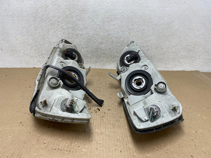 2000 to 2004 Toyota Avalon Halogen Left+Right Headlights AH5946 DW11