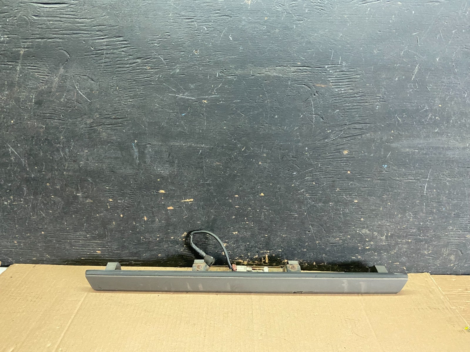 1999 to 2002 Infiniti G20 Rear License Lights Molding G3477 PS1