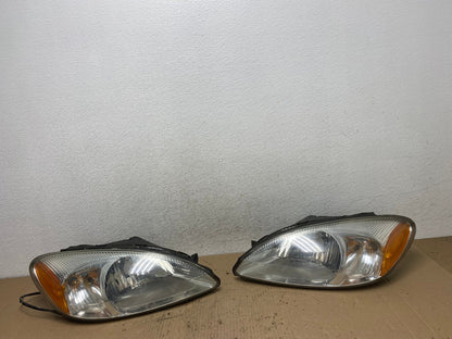 2000 to 2007 Ford Taurus Left+Right Side Halogen Headlights AF4231 LK0