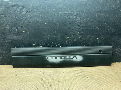 1993-1996 Toyota Corolla  Sedan Rear Center Garnish Panel 76801-12420 Y6513 DG0