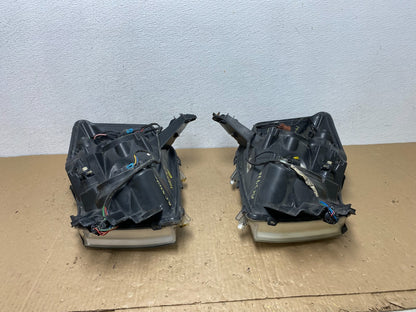 2004 to 2007 Nissan Armada Left+Right Side Set Headlights AC5976 DW12