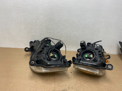 2008 to 2016 Chrysler Town and Country Left+Right Side Headlights AG5383 DW9