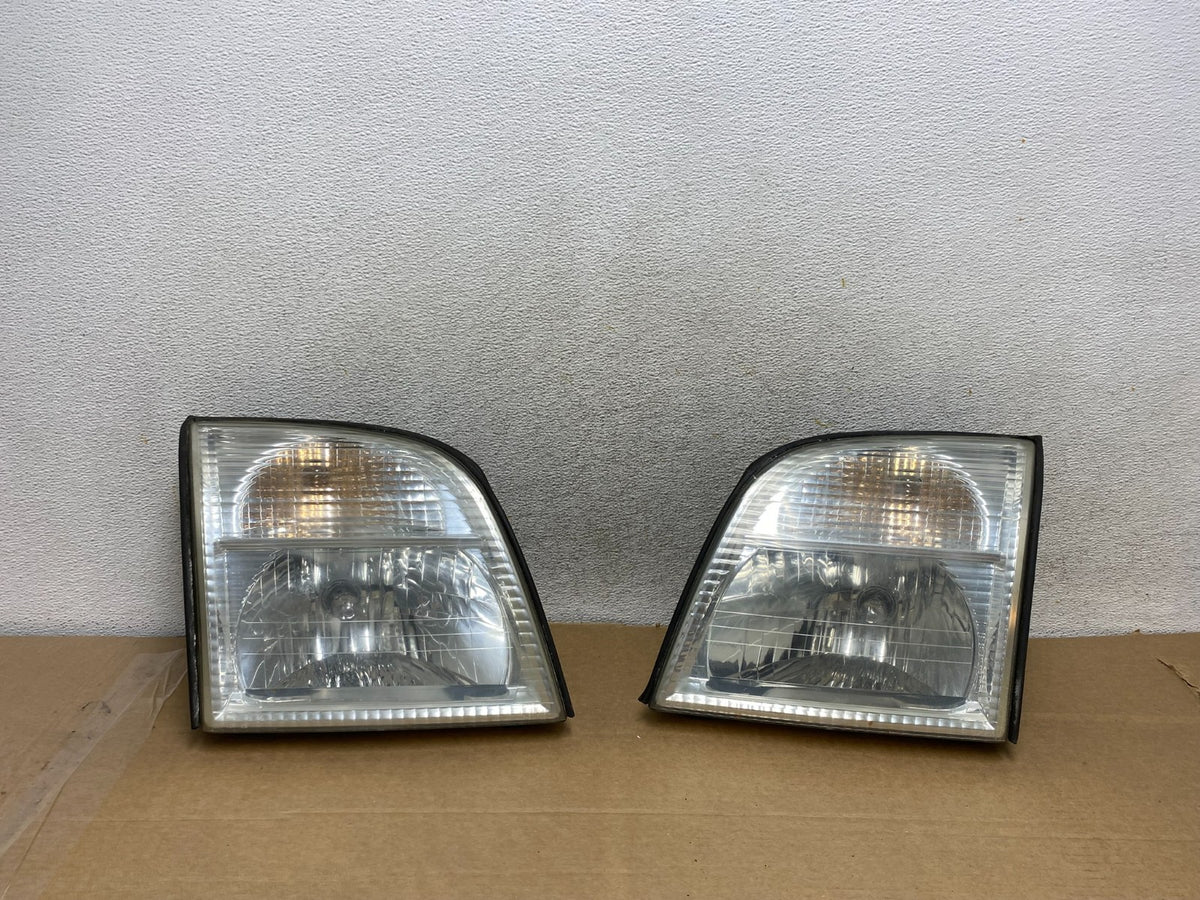 2002-2005 Mercury Mountaineer Left+Right Side Halogen Headlights AH3083 DW0