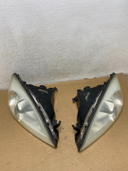 2000 to 2007 Ford Taurus Left+Right Side Halogen Headlights AH8252 DW7