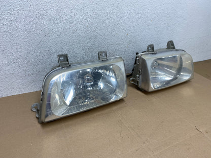 1998 to 2002 Kia Sportage Left+Right Halogen Headlights AE4855 DW2