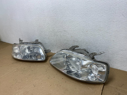 2004 - 2006 Chevrolet Aveo Hatchback Left+Right Headlights Halogen AE9159 DW1