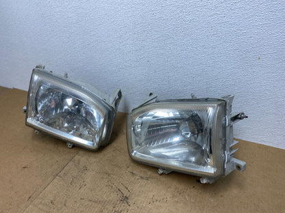 1999-2004 Nissan Pathfinder Left+Right Side Set Halogen Headlights AC3403 DW1