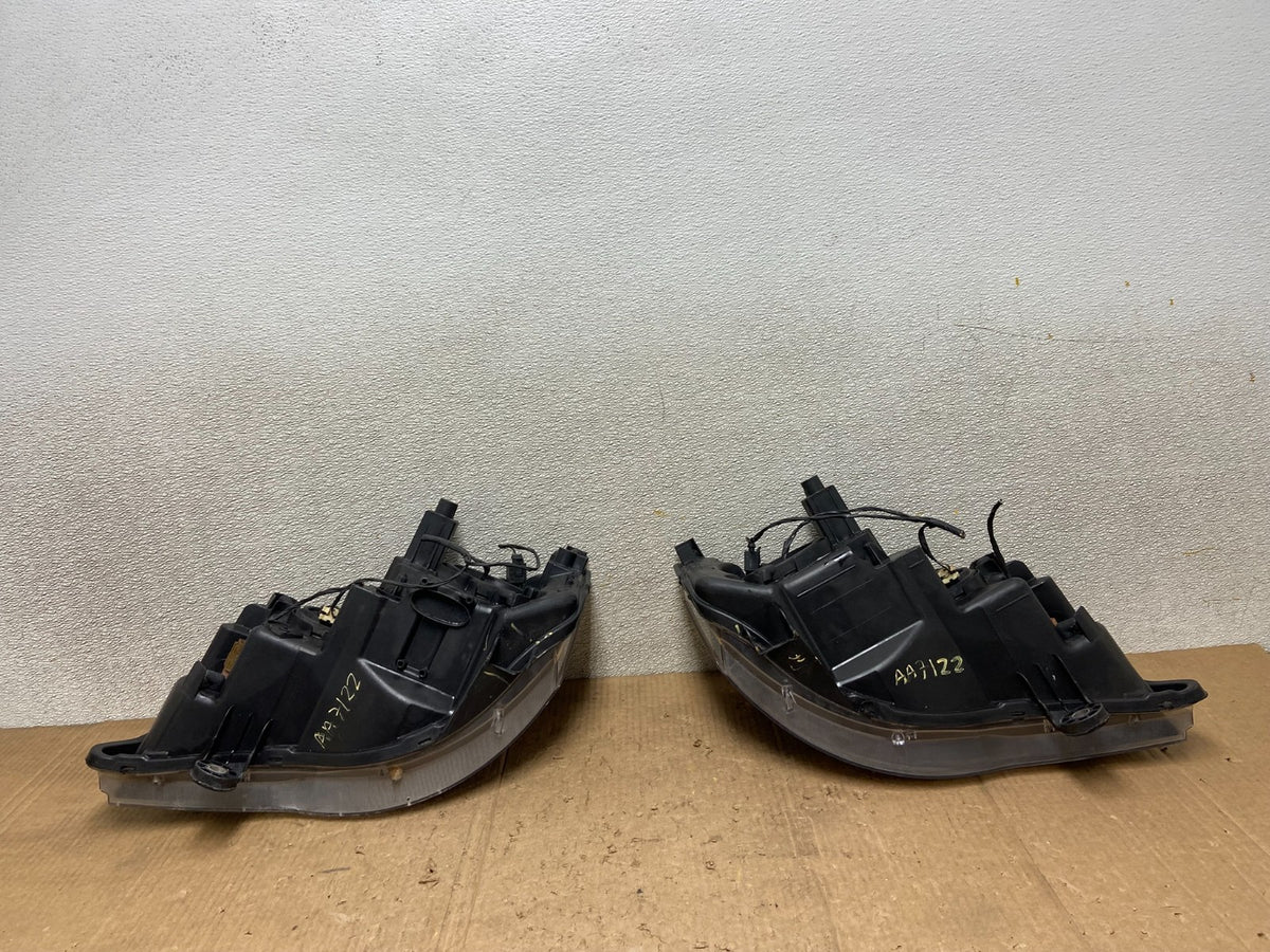 2008 to 2016 Chrysler Town and Country Left+Right Side Headlights AA7122 DW9
