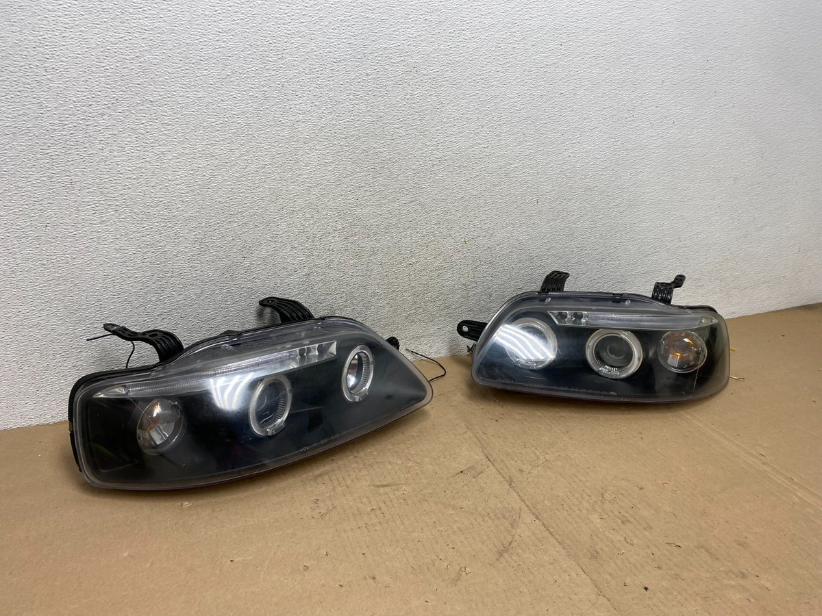 2004 to 2006 Chevrolet Aveo Sedan Aveo5 Left+Right Side Headlights AG46662