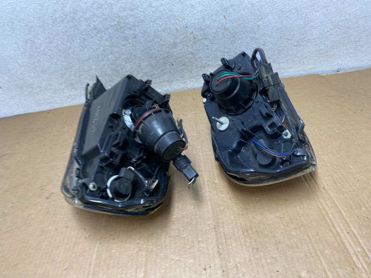 2000 to 2005 Mercury Sable Left+Right Side Halogen Headlights AI8874 DW9