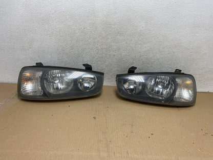 2001 2002 2003 Hyundai Elantra Left+Right Side Set Halogen Headlights AH5728 DW0