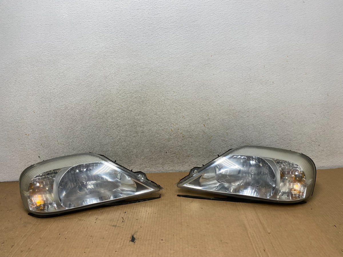 2000 to 2005 Mercury Sable Left+Right Side Halogen Headlights AI8747 DW0