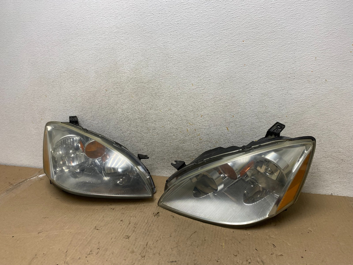 2002 to 2004 Nissan Altima Left+Right Side Set Halogen Headlights AH7648 DW2