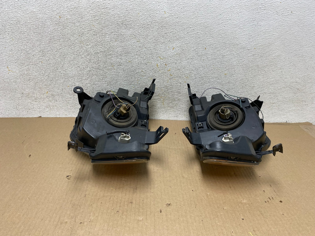 2008 to 2012 Ford Escape Headlights Left+Right Side Set Halogen AH5727 DW10