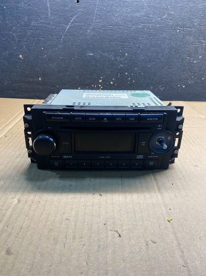 2005-2009 Chrysler Dodge Jeep Ram Radio CD MP3 AUX Receiver AB2682 DG0