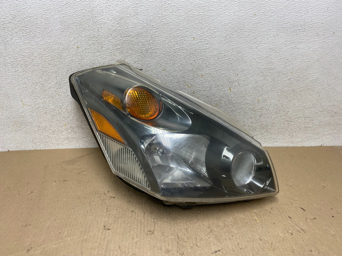 2004 to 2009 Nissan Quest Right Passenger RH Black Headlight TYC AH7652 DW0