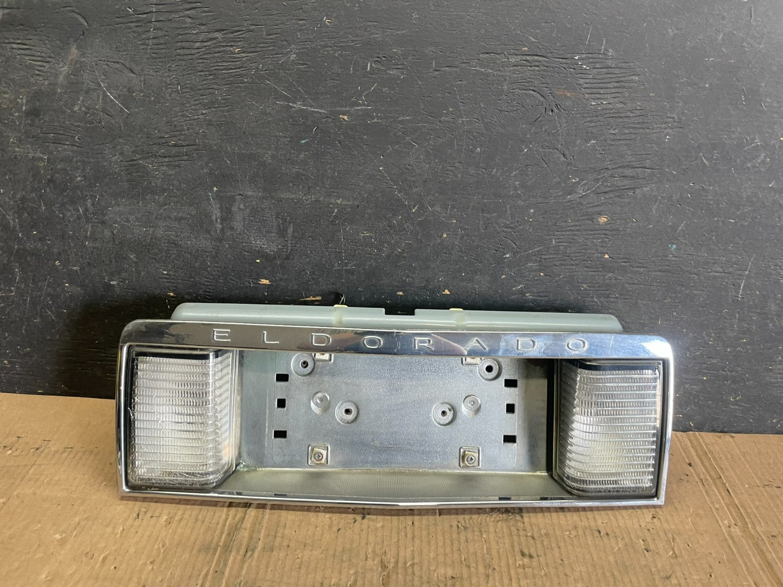 1992 to 2002 Cadillac Eldorado Rear License Plate Trim Panel OEM P8699 DG0