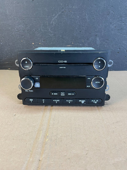 2008 - 2009 Ford Taurus X AM FM Radio MP3 6 Disc CD Player Auxiliary ad5936 DG0