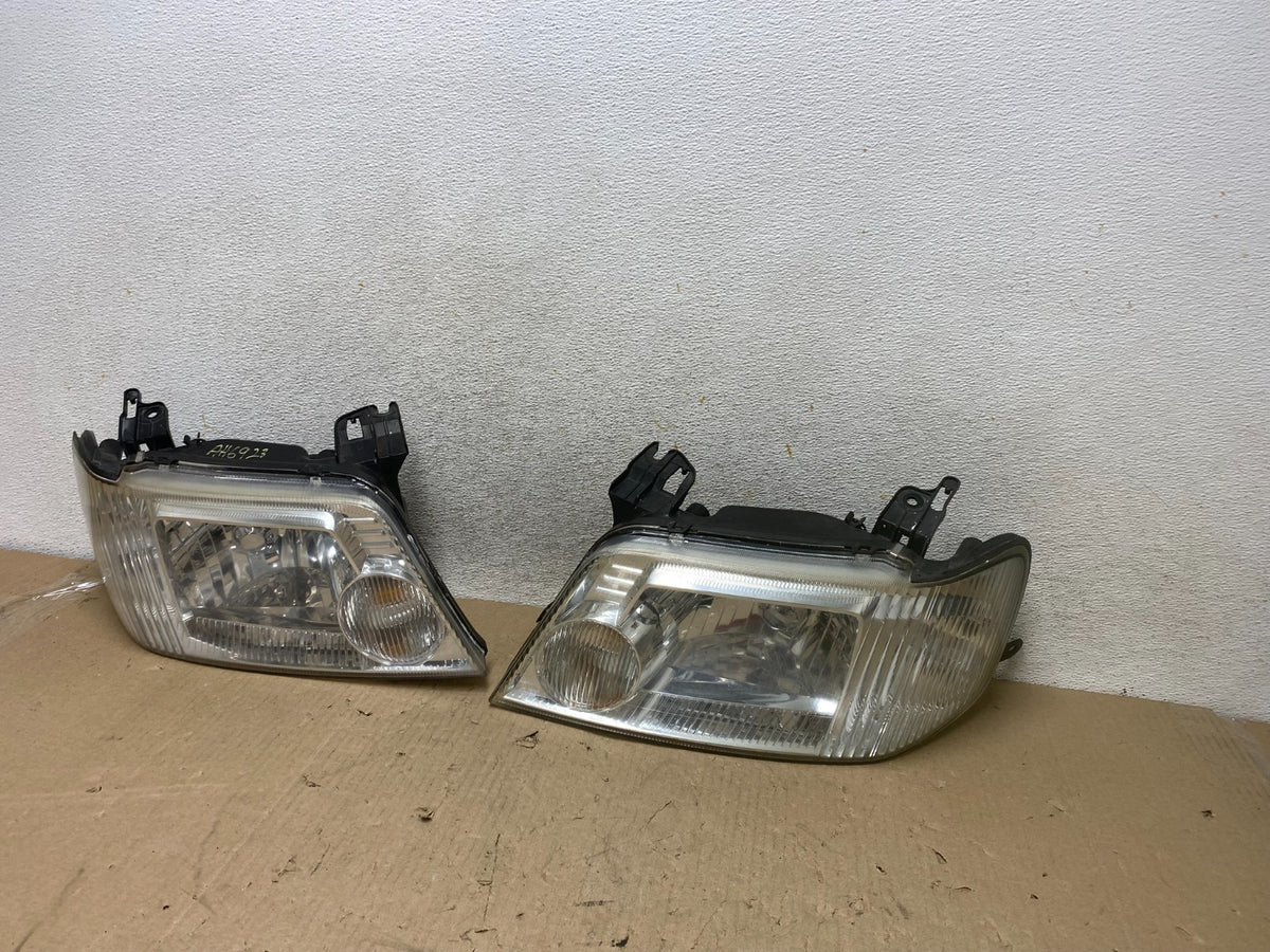 2005 to 2007 Mercury Mariner Left+Right Side Halogen Headlights AH6923 DW2