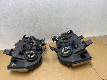 2005-2007 Jeep Grand Cherokee Left+Right Halogen Headlights AI3413 DW11
