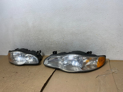 2000 to 2005 Chevrolet Monte Carlo Left+Right Side Set Headlights AI1351 DW1