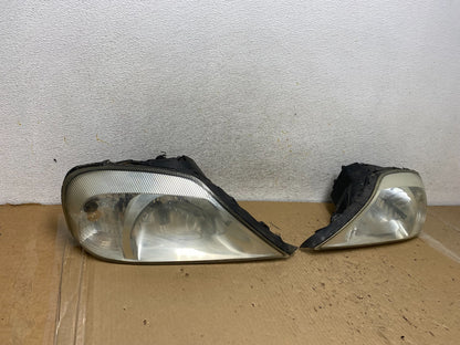2000 to 2005 Mercury Sable Left+Right Side Halogen Headlights AH2849 DW1